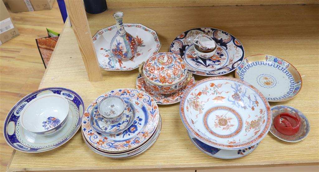 A collection of mixed Chinese and Japanese ceramics, mostly damaged